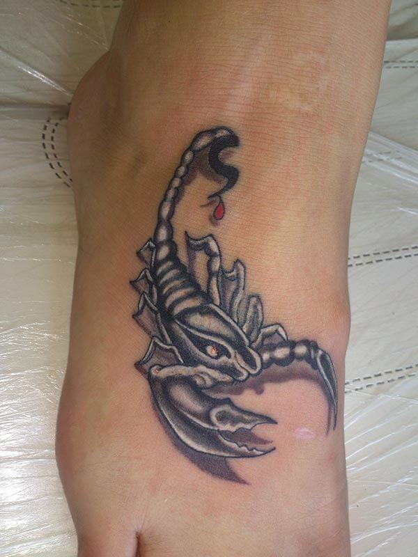 A ravishing scorpion tattoo design on feet for girls