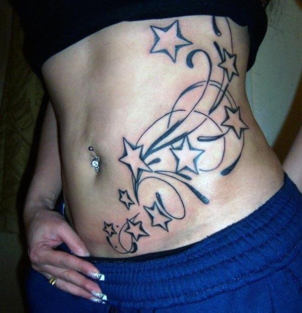 A sexy star tattoo design on side belly for ladies and girls