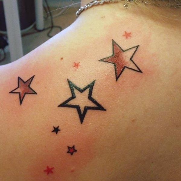 A beautiful star tattoo design on back neck for girls and women