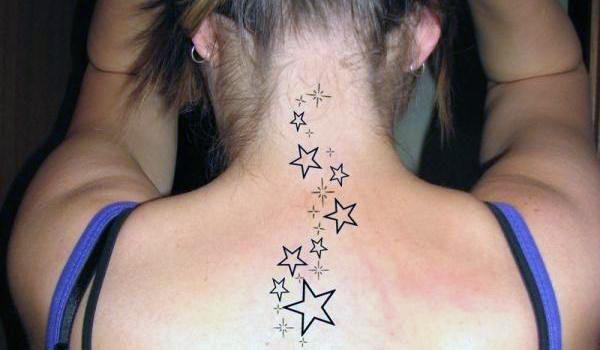 An awe-inspiring star tattoo design on back neck for Women and girls