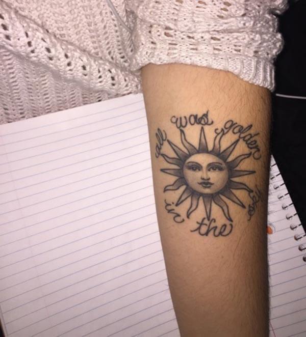 An inspiring sun tattoo design on forearm for Women