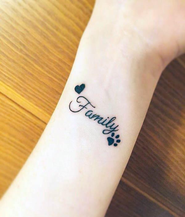 A cute family tattoo design on wrist for girls