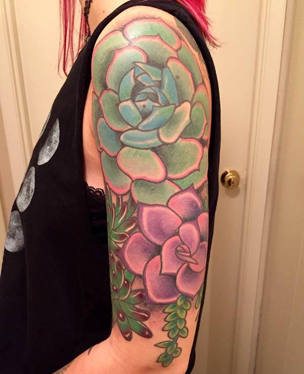 An attractive half sleeve tattoo design for girls