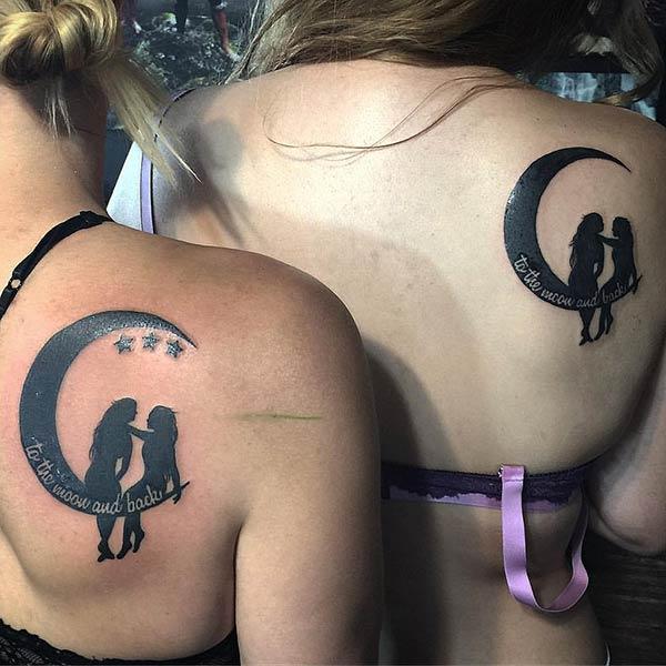 A mind blowing mother daughter tattoo design on back shoulder 