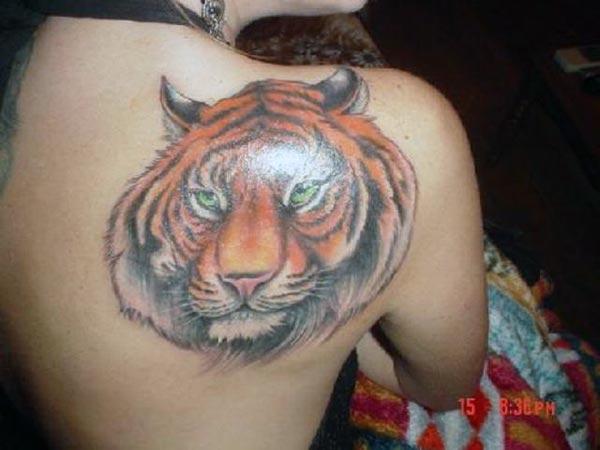 A beautiful tiger tattoo design on side shoulder for girls and women