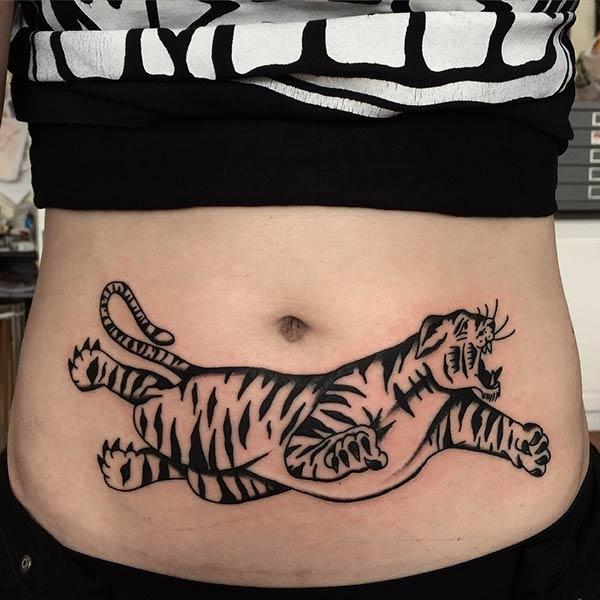 A lovely tiger tattoo design on belly for Women